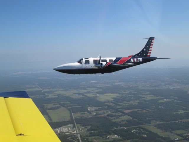 Piper Aerostar (N111CK) - N111CK fly wing of RV9A N103LF