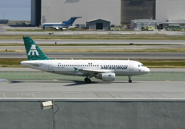 Airbus A319 (XA-CMA) - KSFO - Mexicana A319 rolling to the gate - unsure where it arrived from. 4-1-2005.