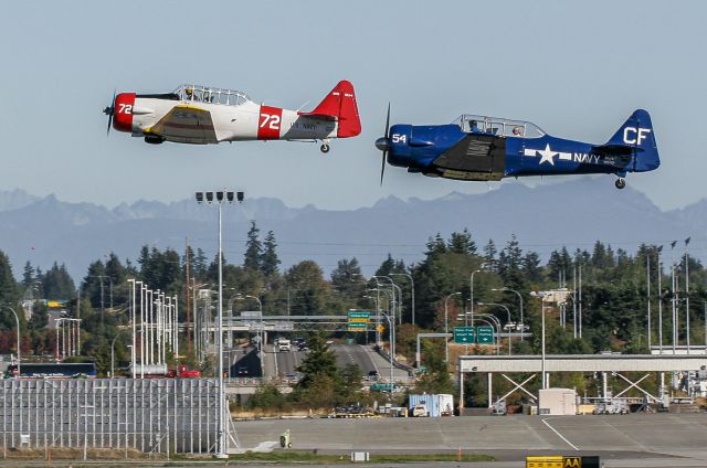 North American T-6 Texan (N154CF) - Several versions of the T-6 Texan head out of Paine Field, Everett, Washington, USA