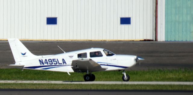 Piper Cherokee (N495LA) - Taxiing for departure is this 2021 Piper Cherokee PA-28-181 "Pilot 100i" in the Autumn of 2022.