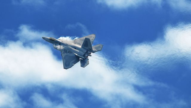 Lockheed F-22 Raptor — - Burning up the clouds.