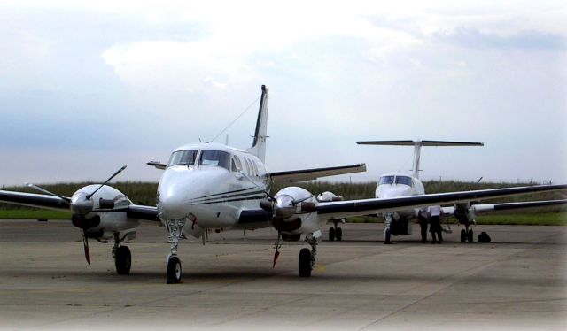 Beechcraft King Air 90 (ZS-OAE) - At Umtata (FAUT), South Africa. Charter flight together with a B200