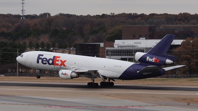 McDonnell Douglas DC-10 (N320FE) - "Kyndall" touching down on 18R.