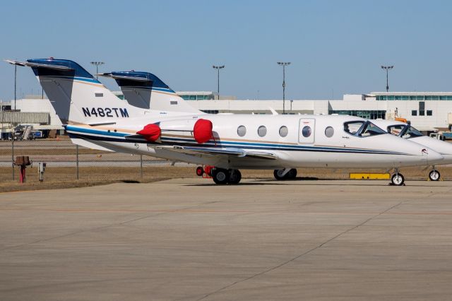 Beechcraft Beechjet (N482TM) - BE40 sitting with engine covers on at Delta Jet Center at CVG