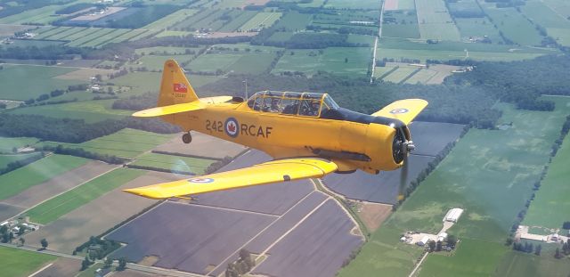 C-FWPK — - Formation flight with Harvard aircraft association. Landscspe shot for Tom...