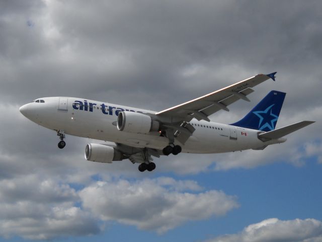 C-GTSK — - Airbus 310-304 landing on runway 23.