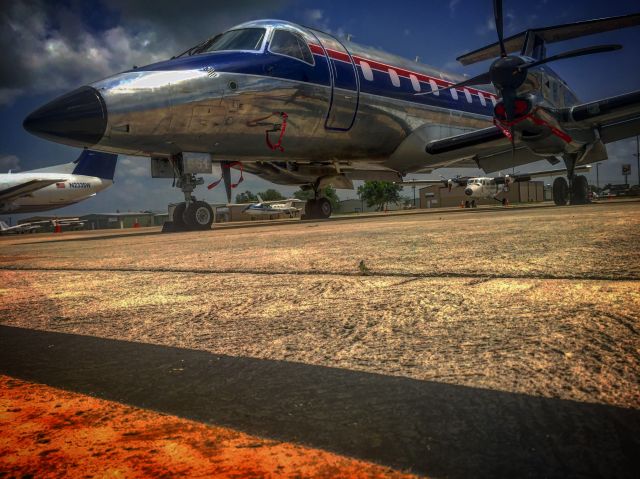 Embraer EMB-120 Brasilia (N561SW) - Texas heat makes these Brazilians look good. 