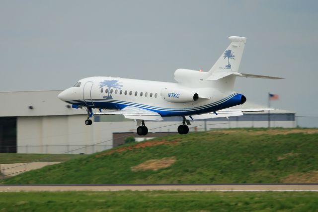 N7KC — - Falcon 900 EX used by Kenny Chesney  arrives in Nashville. Logo on the tail includes the title from one of his songs, "Living in fast forward."