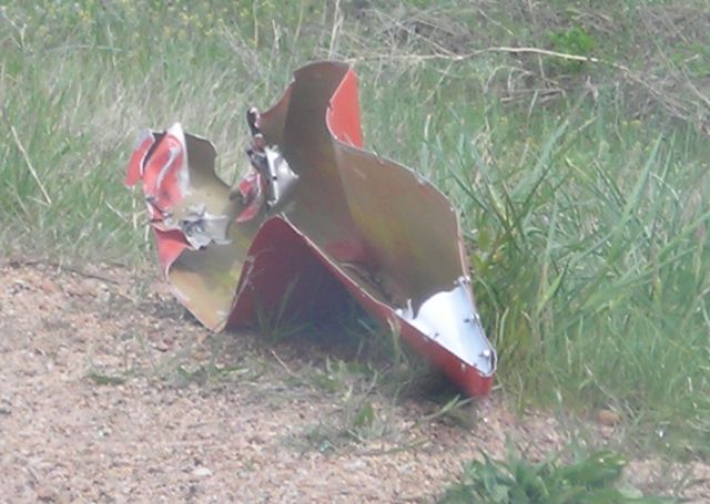 Beechcraft 35 Bonanza (N8SM) - Piece of aircraft on other side of road, opposite where it came to rest... still there the following day.