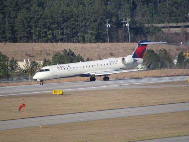 Canadair Regional Jet CRJ-700 (N738EV) - Delta Connection (ExpressJet) flight 5205 to Cleveland-Hopkins Intl, a Bombardier CRJ700 turning onto runway 23R. This was taken January 30, 2016 at 3:45 PM.