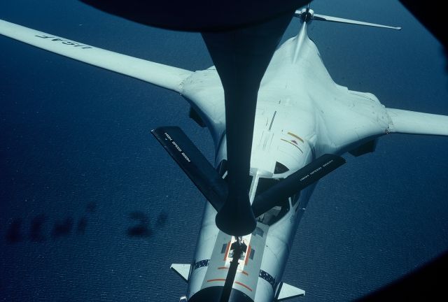 — — - Refueling the B-1A over the Pacific during initial flight testing out of Edwards AFB with F-111 chase plane  August 1976