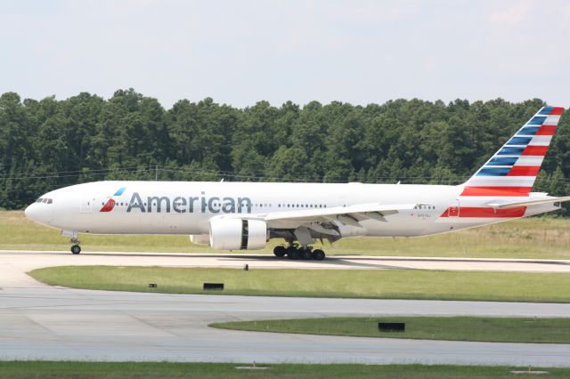 Boeing 777-200 (N767AJ) - N767AJ landing roll out runway 23R