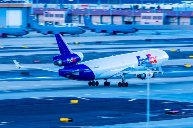 Boeing MD-11 (N591FE) - A FedEx MD11 taking off on a cloudy morning at PHX on 1/17/23. Taken with a Canon R7 and Tamron 70-200 G2 lens.