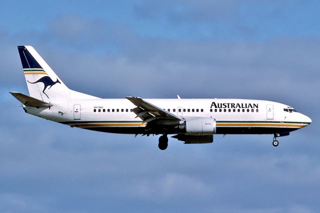 Fairchild Dornier SA-227DC Metro (VH-TAG) - AUSTRALIAN AIRLINES - BOEING 737-376 - REG : VH-TAG (CN 23478/1251) - ADELAIDE INTERNATIONAL AIRPORT SA. AUSTRALIA - YPAD 12/2/1988 35MM SLIDE CONVERSION USING A LIGHTBOX AND A NIKON L810 DIGITAL CAMERA IN THE MACRO MODE.