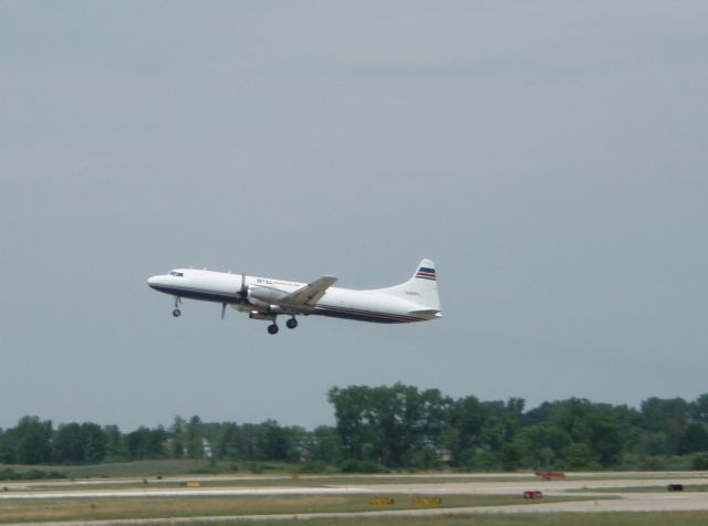 CONVAIR CV-580 (N361FL) - Convair 580 departing Runway 24 at KJXN.