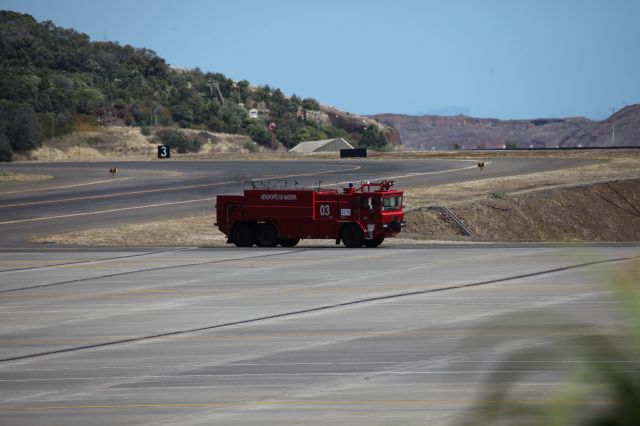 — — - Fire fighters drove near the runway while TAP A320 (CS-TQD) was landing. Landing went well and maybe they were just spending their time there?