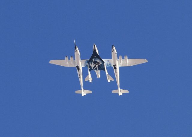 Scaled Composites White Knight 2 (N348MS) - White Knight Two and SpaceShipTwo on Thursday, June 9 after a failed drop/feather/glide test.  The spacecraft failed to release from the mothership.