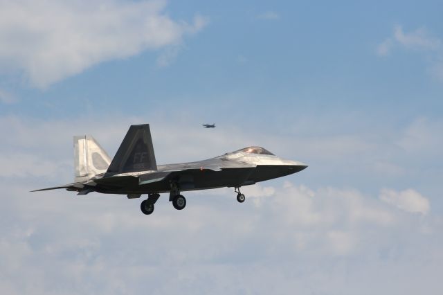 Lockheed F-22 Raptor (AFR8155) - A Langley AFB F-22 Raptor is seconds from "wheels down" at Volk Field.br /br /A L139 is entering the pattern. 