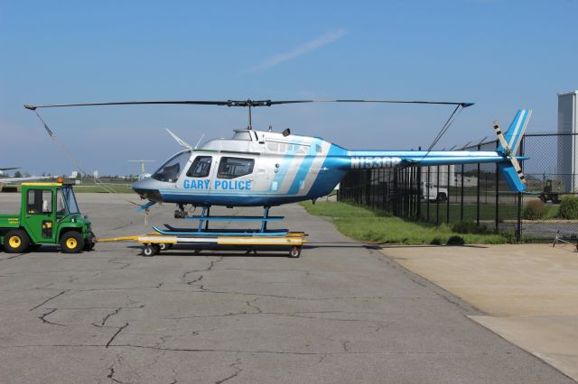 N153GP — - Gary Police Department Helicopter "Papa Charlie" out on the ramp in front of its hanger at Gary Regional Airport.