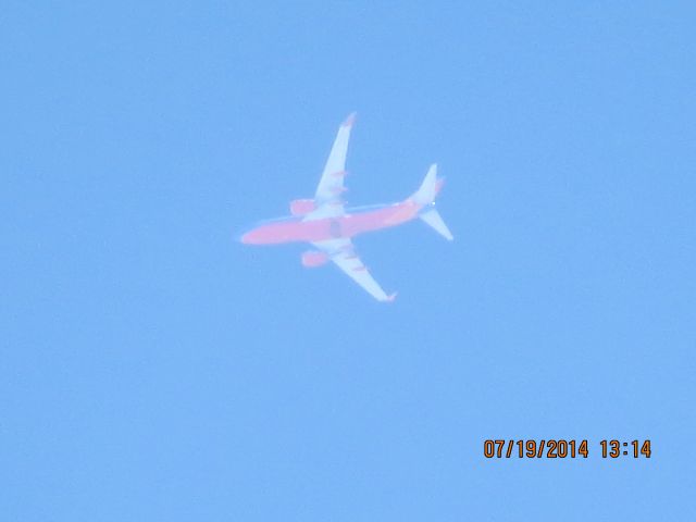 Boeing 737-700 (N210WN) - SWA flight 3247 from ATL to DEN over Baxter Springs KS(78KS) at 38k feet.