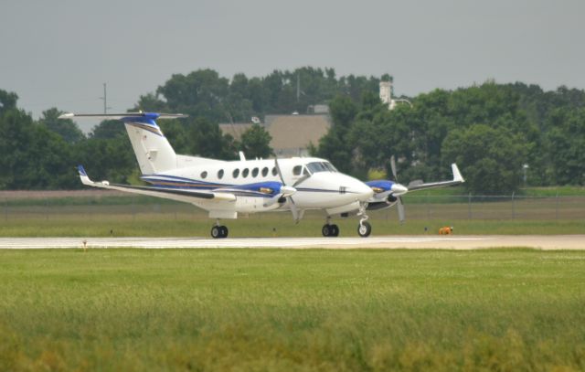 Beechcraft Super King Air 200 (N222CY) - N222CY departing Sioux Falls SD on Runway 15 on 6-12-15