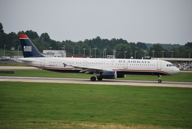 Airbus A321 (N507AY) - Rolling down runway 18C - 6/17/09