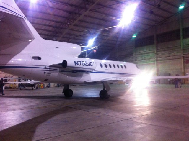 Dassault Falcon 50 (N752JC) - The 50 waiting to be pulled out into the snow.