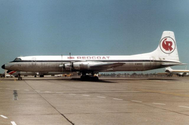 Canadair CL-44 Forty Four (G-BRED) - Seen here in Jul-83.  With Redcoat Air Cargo from Aug-80 to Nov-83 when it became N106BB then EL-AMC, 7Q-YMS and TN-235.