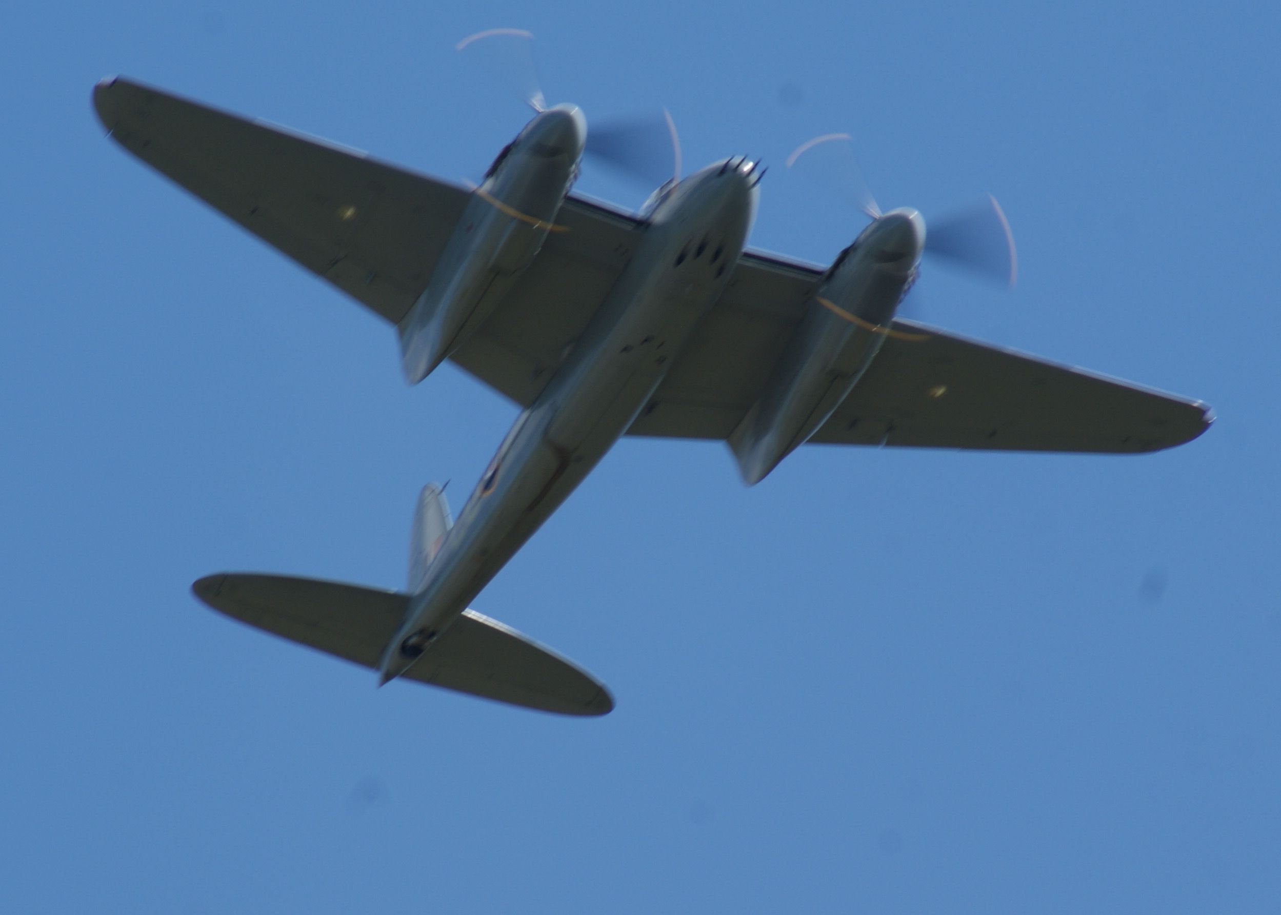 De Havilland Mosquito (N114KA) - de Havilland Mosquito overhead. An amazing Warbirds over the Beach 2021 airshow at Jerry Yagen’s Military Aviation Museum at Pungo, VA near Virginia Beach, 2-3 October 2021. If you’ve never attended one of his airshows, you ought to check it out. Multiple formations of US Army Air Corps, US Navy, RAF, and German aircraft. With Covid, this show was a combined WWI, WWII, etc. airshow. 