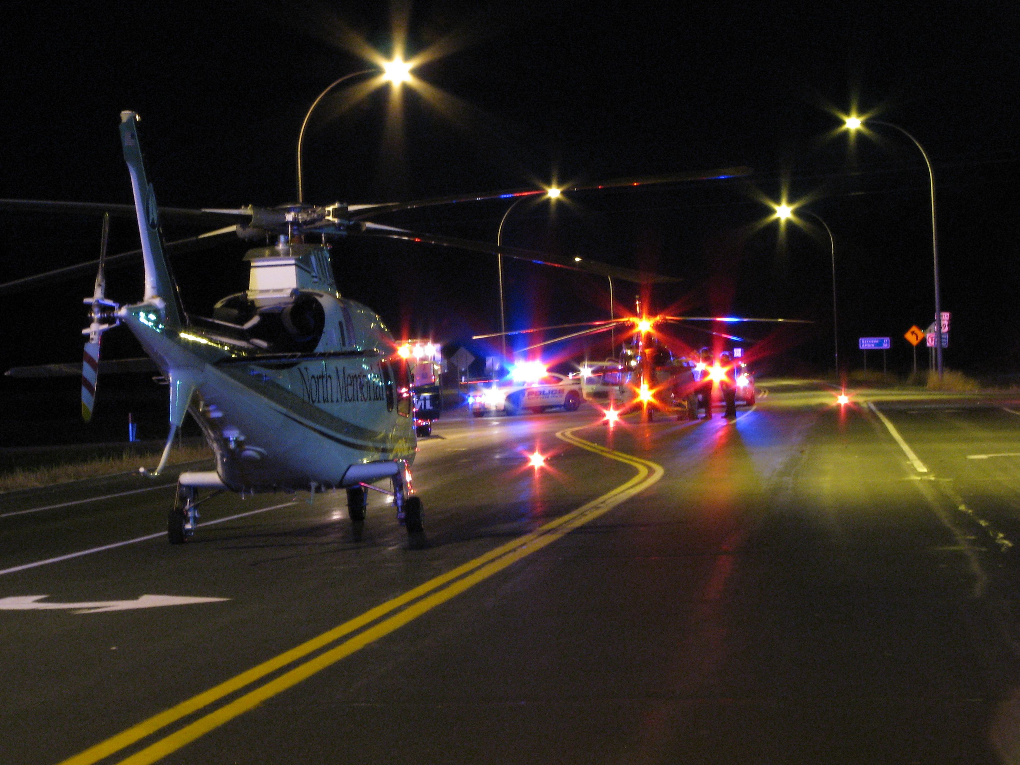 SABCA A-109 (N10NM) - Two Air Care ships at a crash scene in Minnesota