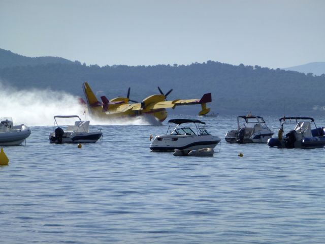 — — - photo taken in Pollenca bay, north Mallorca, Spanish air force firefighter.