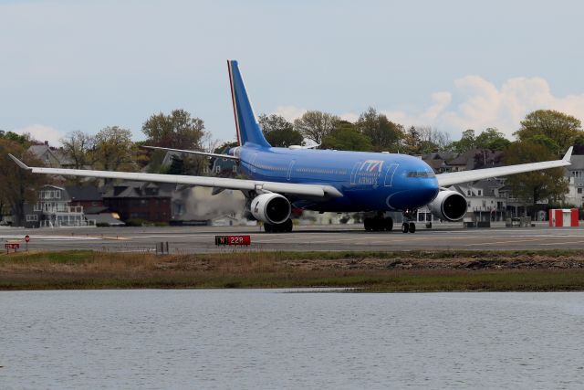 Airbus A330-300 (EI-EJL) - 'Itarrow 614' from Rome taxiing off of 4R