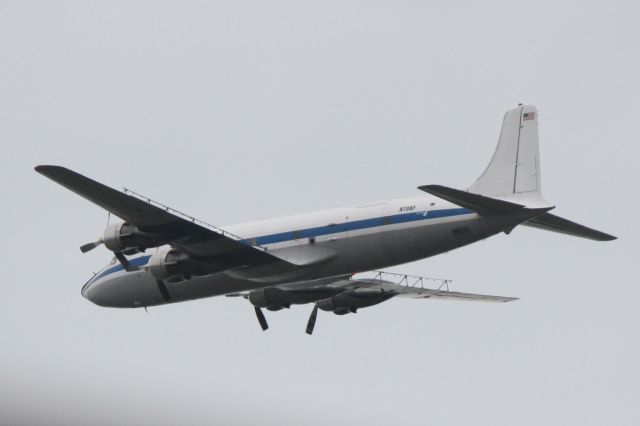 Douglas DC-6 (N70BF) - Douglas DC-6 (N70BF) departs Venice Municipal Airport