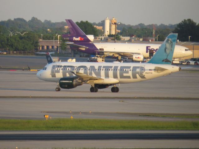 Airbus A319 (N927FR) - Taken May 6, 2014 from airport overlook.