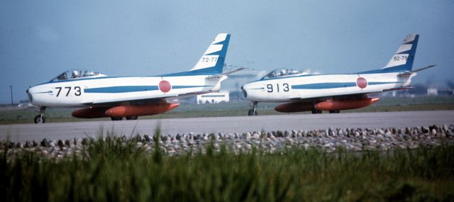 — — - Two FJ-4 taxing to take-off at MCAAS Iwakuni 1967