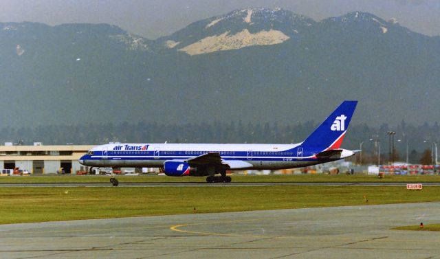 Boeing 757-200 (C-GTSF) - CYVR - Air Transat departing Vancouver BC Canada in spring 1998 Boeing 757 CN: 25491 LN:511 departing to Las Vegas. Photo taken from the YVR old south terminal parking lot.