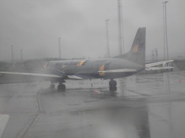 — — - West Europa Cargo SE-MAJ on rainy Bergen Flesland