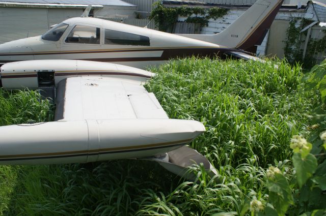 Cessna 310 (N131KM) - Sitting in the grass after being abandoned 