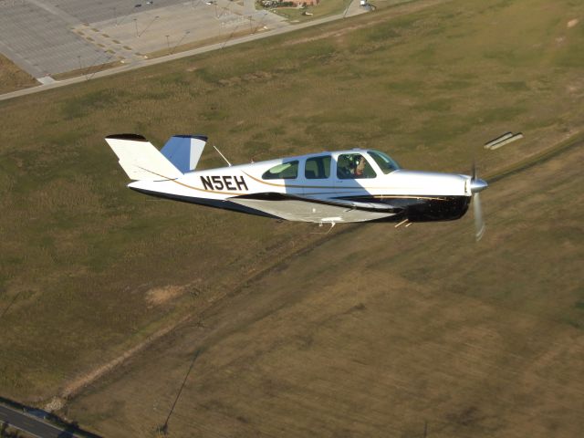 Beechcraft 35 Bonanza (N5EH) - In flight over Houston