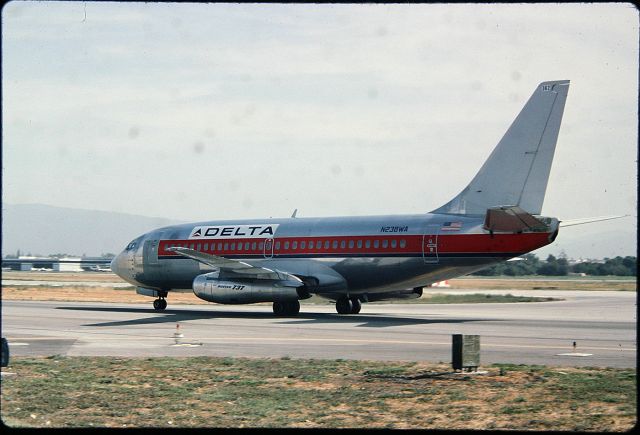 Boeing 737-200 (N238WA) - SJC - Hybrid Delta/Western merger aircraft after landing at SJC and taxi to the old Terminal C. 35mm slide to digital conversion. Summer 1987 date apprx