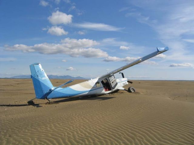 C-FXOH — - As previous mentioned, unfriendly terrain, sandbars are sometimes deceiving. This Helio was completely disassembled and trucked to a repair facilty....