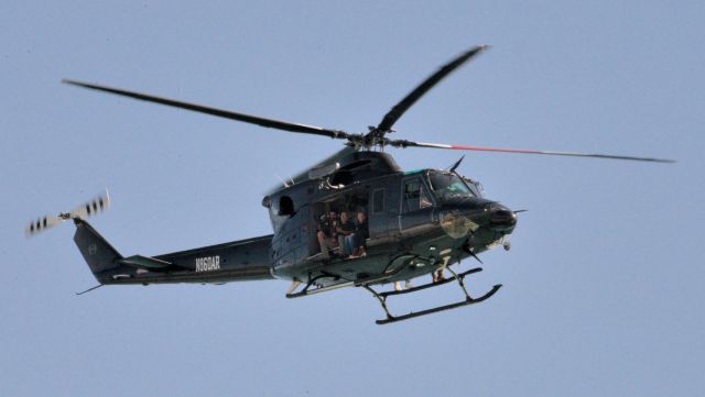 Bell 412 (N860AR) - Heading south over the beaches after leaving Melbourne Orlando International Airport. Photo Julian Leek