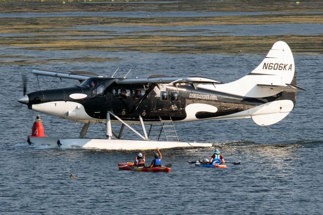 De Havilland Canada DHC-3 Otter (N606KA) - Kenmore's beautiful Wild Orca Turbine Otter taxiing past resident kayakers on Lake Washington.