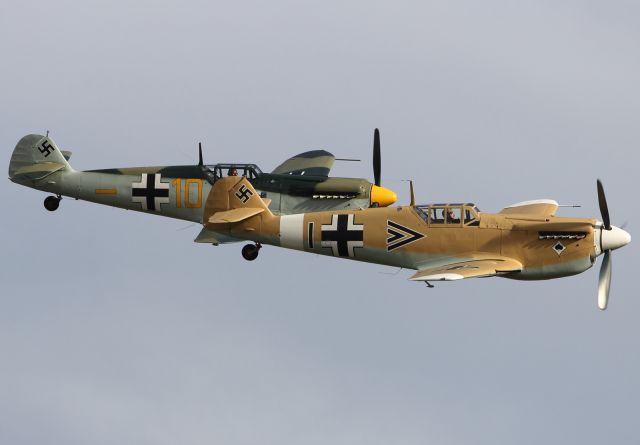 — — - Flypast at Duxford Air Museum.