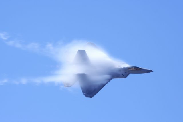 Lockheed F-22 Raptor (AFR05084) - This was taken at the Point Mugu open house March 31, 2007. Near the ocean gave nice vapor trails on the wings.