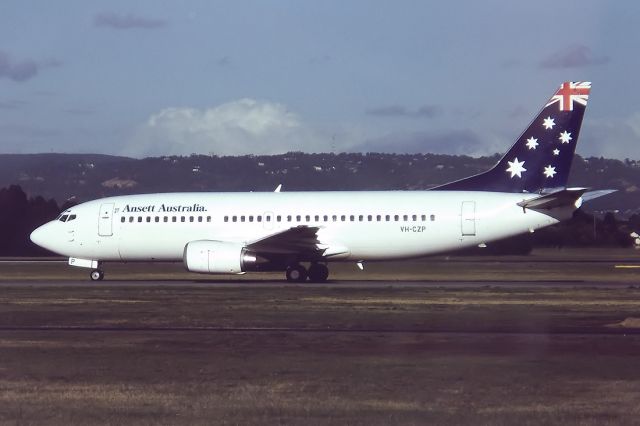 Lockheed EC-130J Hercules (VH-CZP) - ANSETT AUSTRALIA AIRLINES - BOEING 737-377 - REG : VH-CZP (CN 24305/1641) - WEST BEACH ADELAIDE SA. AUSTRALIA - YPAD (4/7/1993) 35MM SLIDE CONVERSION USING A LIGHTBOX AND A NIKON L810 DIGITAL CAMERA IN THE MACRO MODE