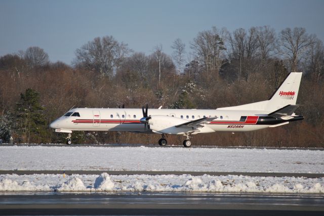 Saab 2000 (N509RH) - Arriving on runway 02 at Concord Regional Airport - 3/2/09