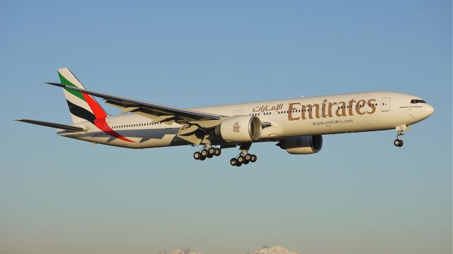 BOEING 777-300 (A6-EGL) - BOE190 on final approach to runway 16R to complete its maiden flight on 12/22/11.