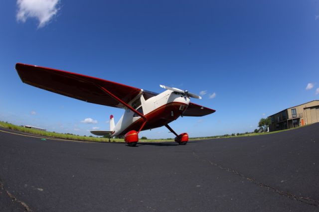 Cessna 140 (N140LA) - On the ramp at Breckenridge, Texas in front of HP hangar..