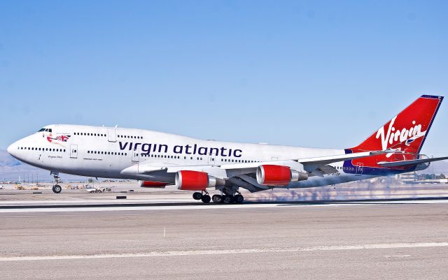 Boeing 747-400 (G-VTOP) - Virginia Plain making smoke.